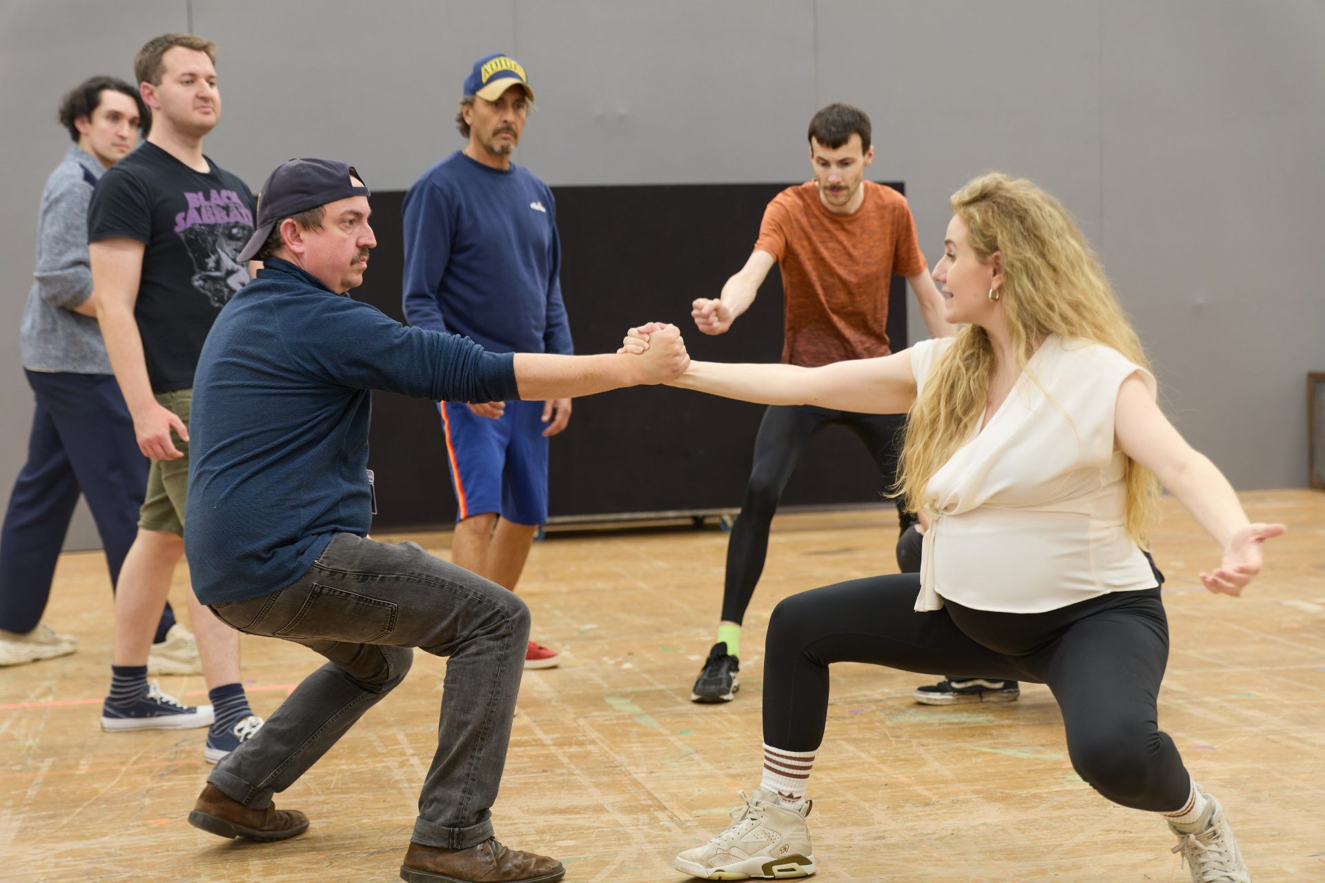 Sion Pritchard and Laura Meaton (Movement Director) in rehearsals for Odyssey '84. Photography by Mark Douet.